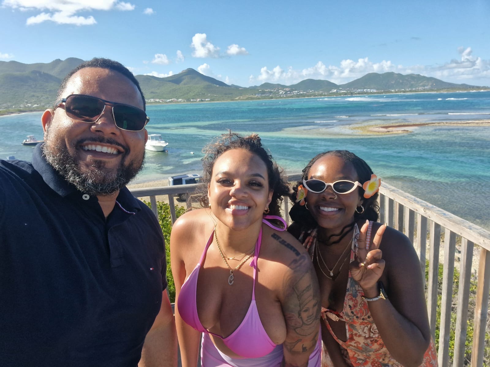 Turquoise water and green hills — the view stop guests never forget.